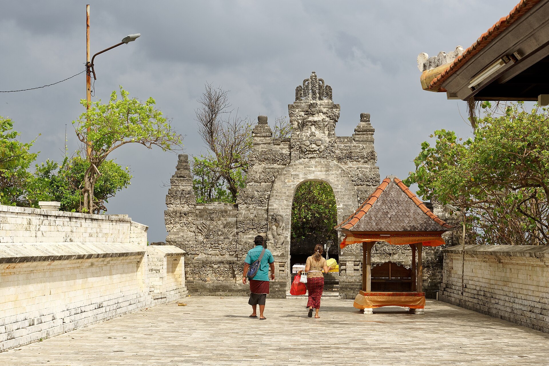 The clifftop temple of Uluwatu above the Indian Ocean on Bali's Bukit Peninsula in the late afternoon light.