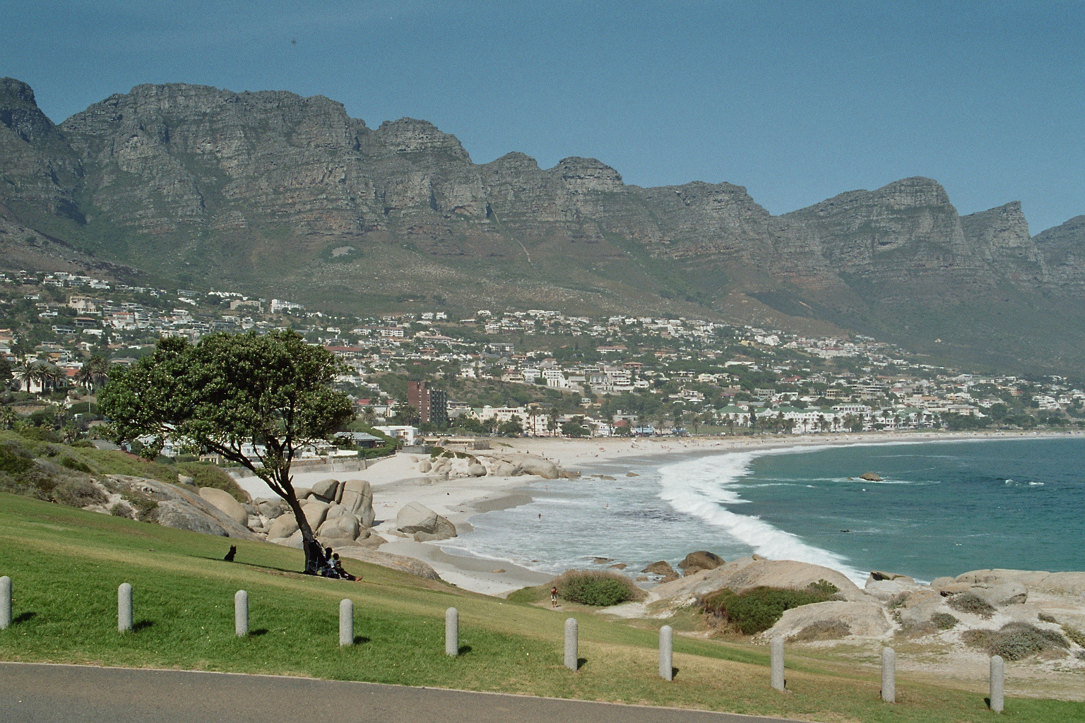 Camps Bay beach on Cape Town's Atlantic Seaboard beneath the Twelve Apostles mountains