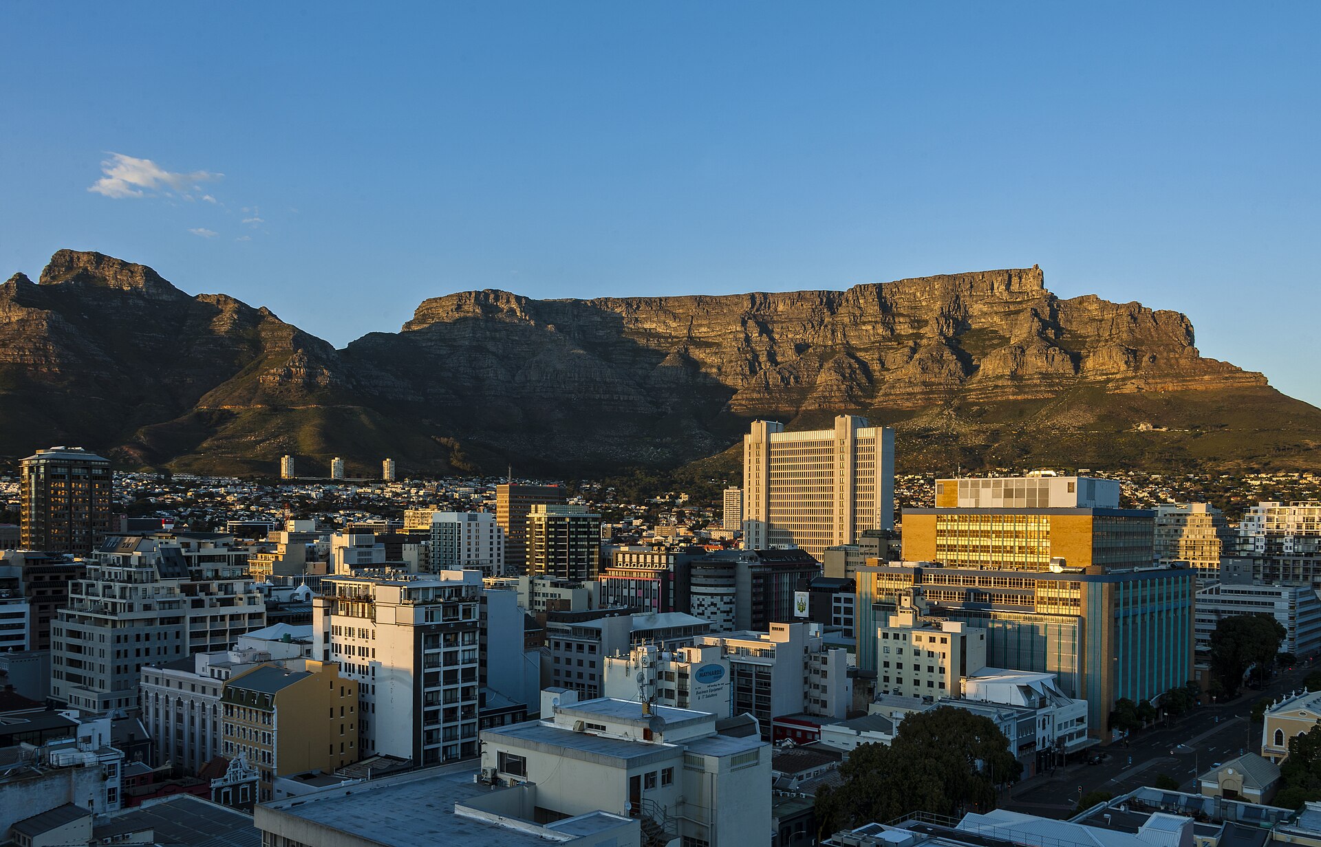 Table Mountain rising behind central Cape Town and Table Bay harbor, South Africa