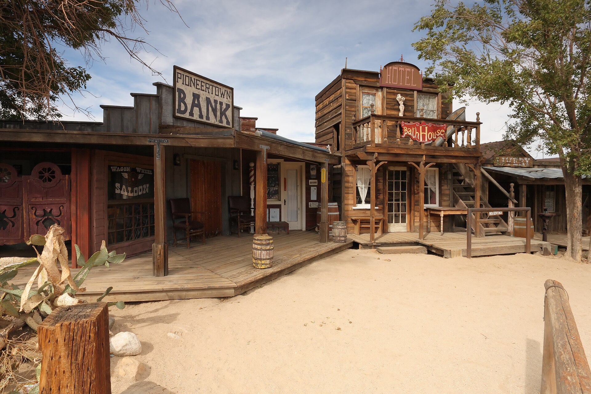 The wooden false-front buildings of Mane Street in Pioneertown, California, a 1946 Western film set now lined with small shops and a saloon.