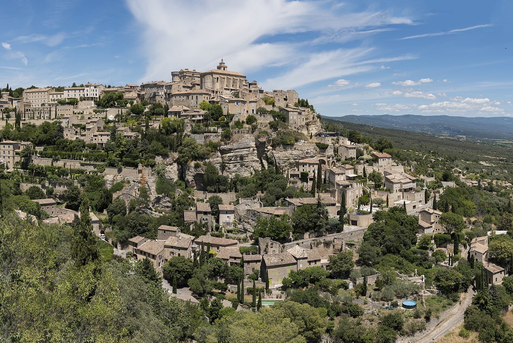 The hilltop village of Gordes in the Luberon, its pale stone houses rising above the valley