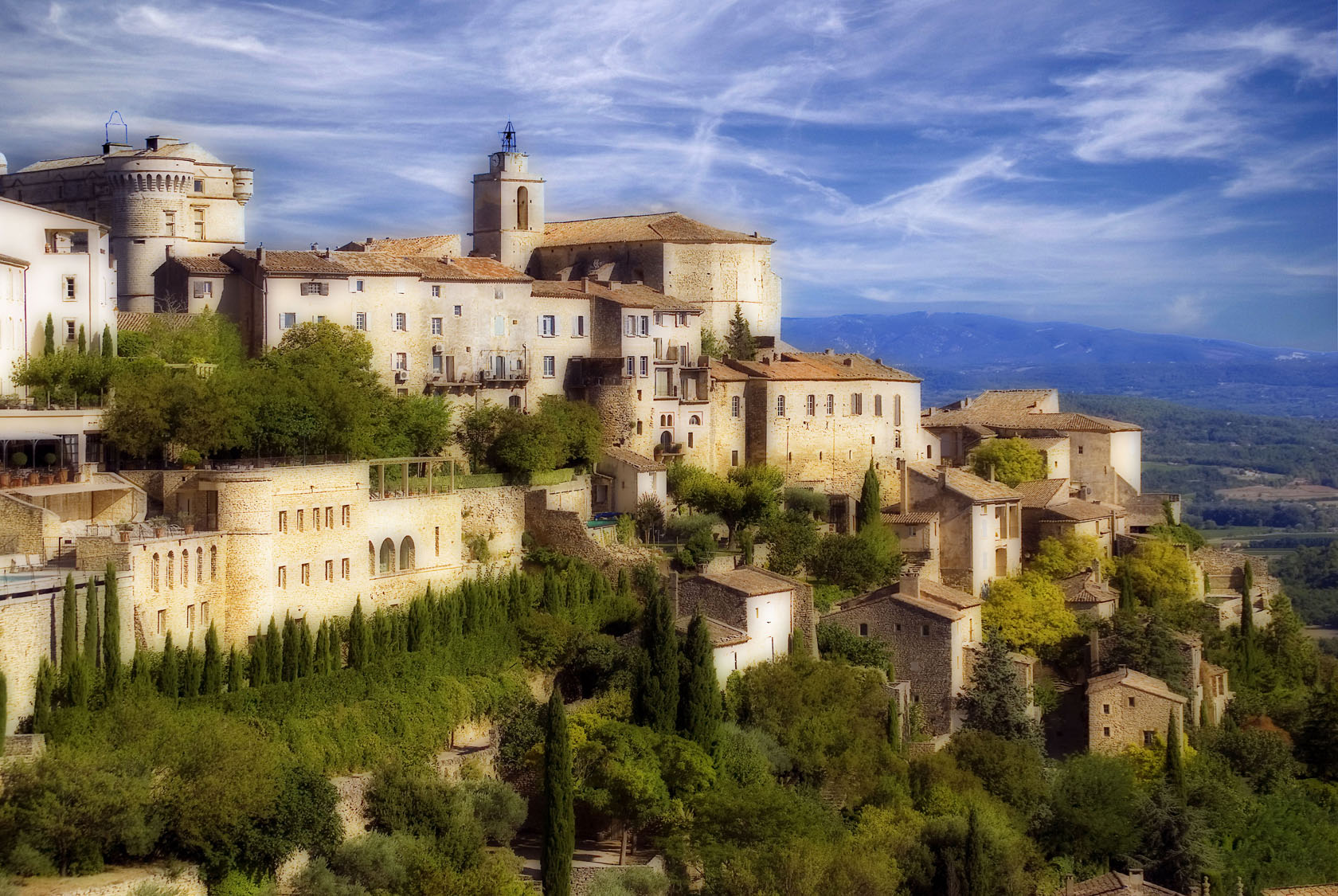 The hilltop village of Gordes in the Luberon, its pale stone houses stacked above the valley