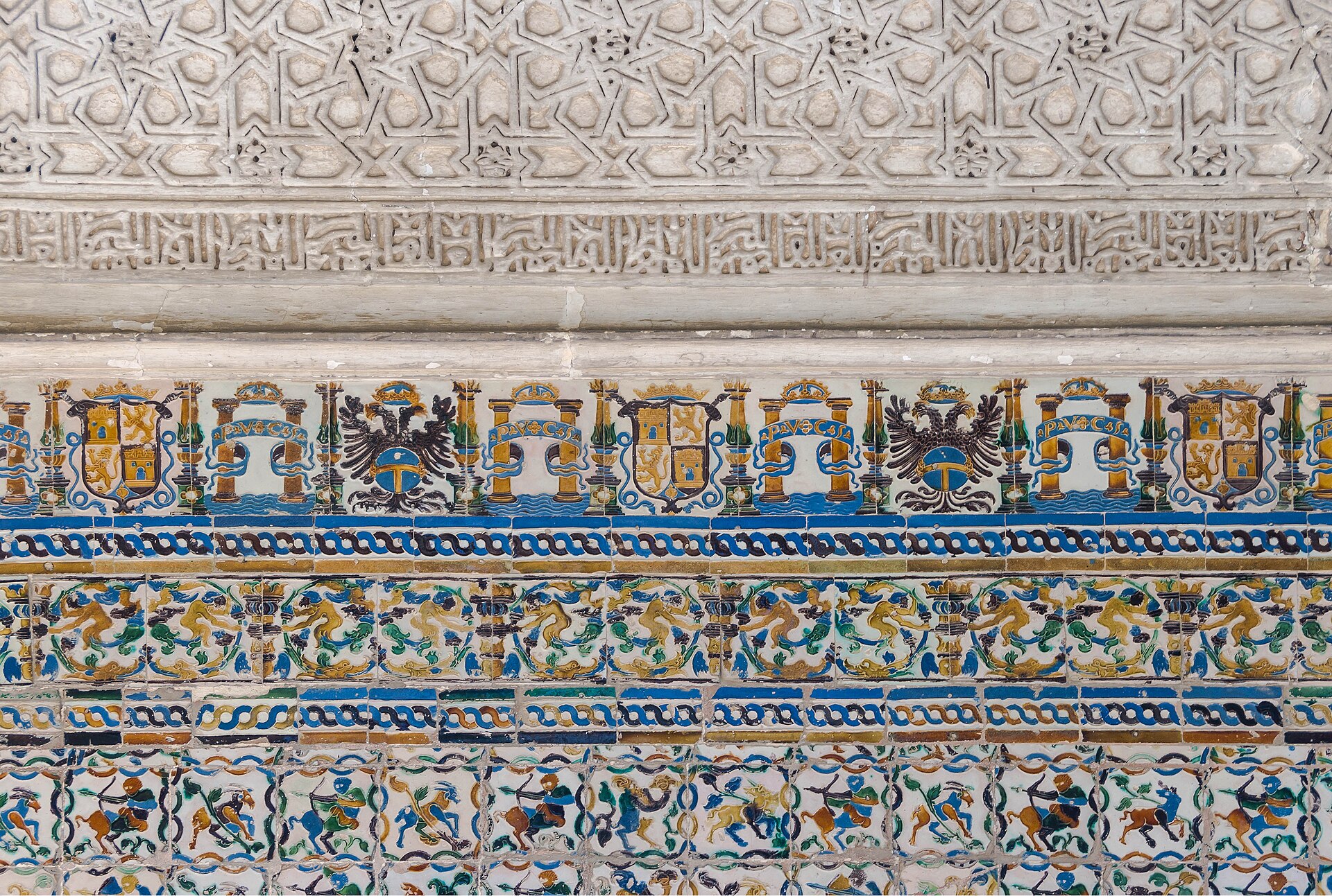The tiled courtyards and clipped hedges of the gardens at the Real Alcázar in Seville.