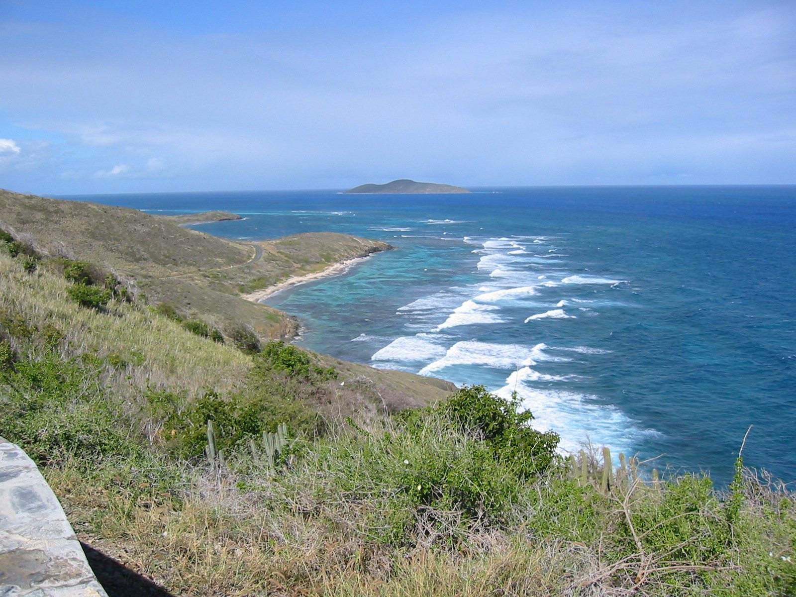 Boiler Bay and the rocky East End coast of St. Croix seen from Point Udall, with Buck Island on the horizon.