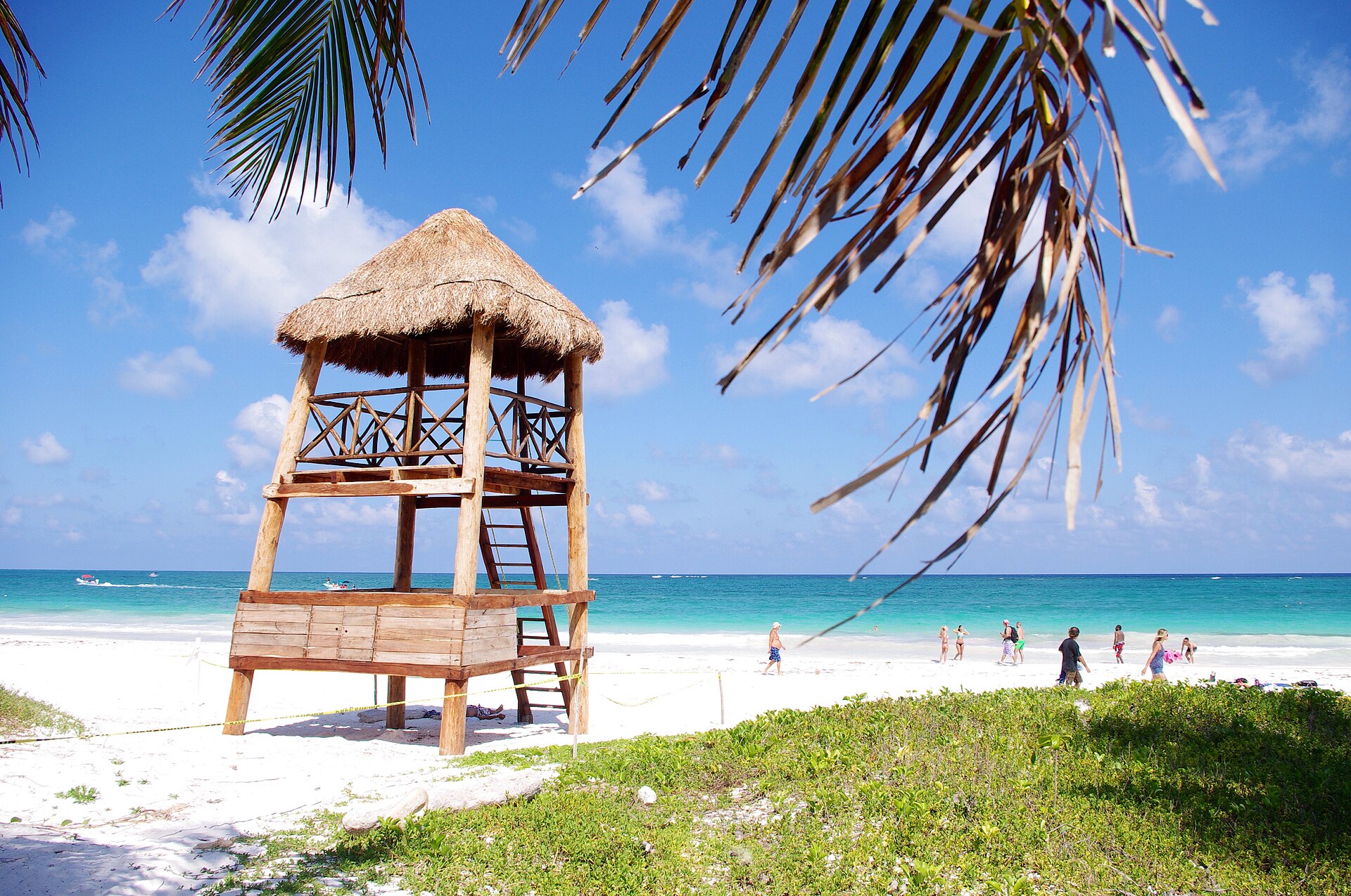 Bicycles parked along the narrow jungle-lined beach road in Tulum's hotel zone
